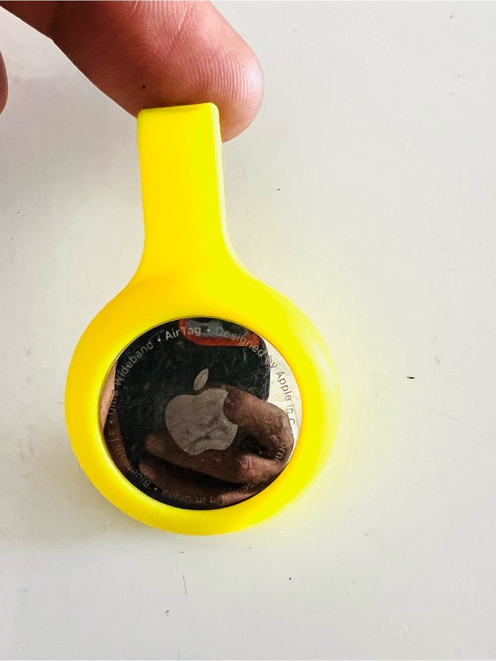 Apple AirTag in Yellow Silicone Clip Holder